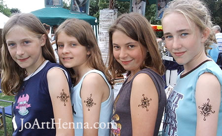 girl group with different henna designs